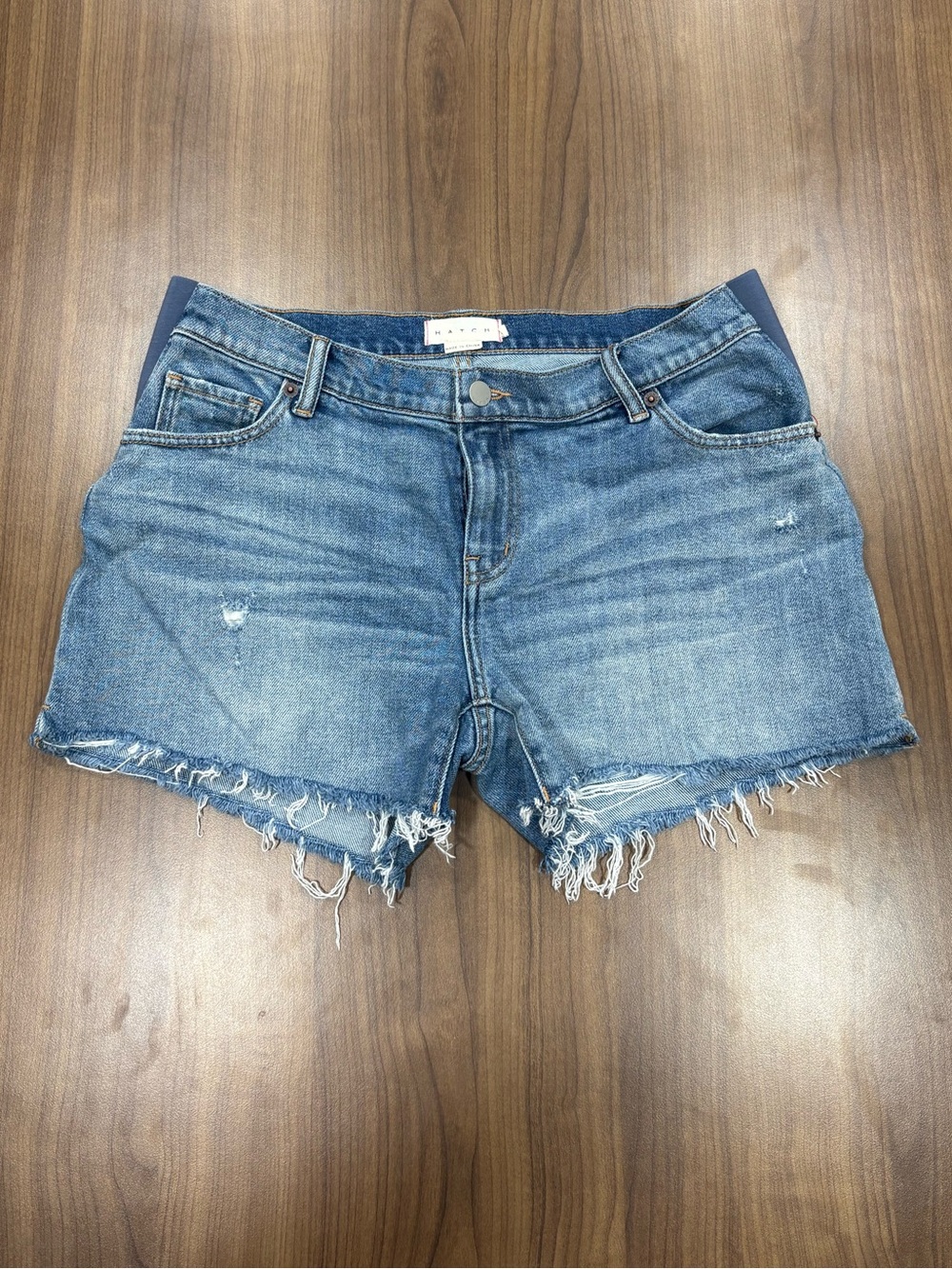 HATCH The Cut Off Denim Maternity Shorts - Blue Distressed Under-The-Belly